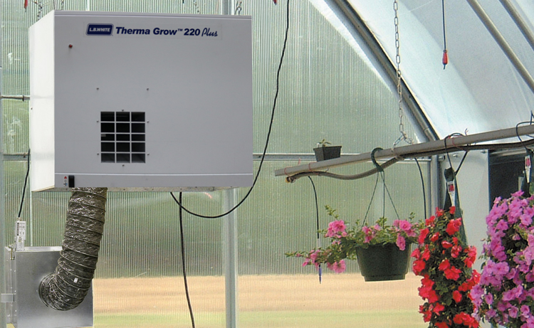 Therma Grow 2.0 forced air heater inside a greenhouse facility.