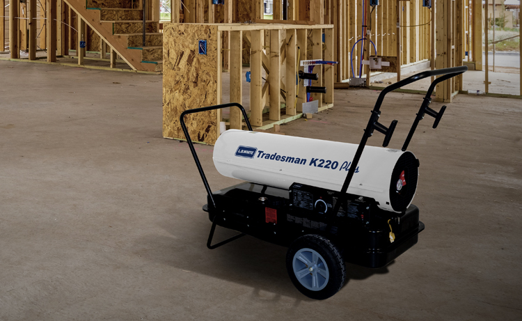 Tradesman K portable forced air kerosene heater at a construction site.
